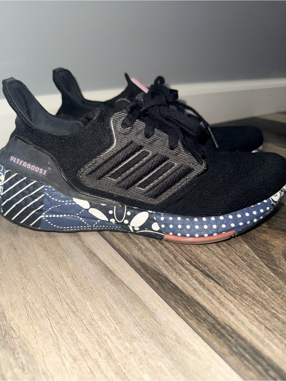 adidas women’s Black Ultraboost Sneakers with Patterned Blue and White Midsole